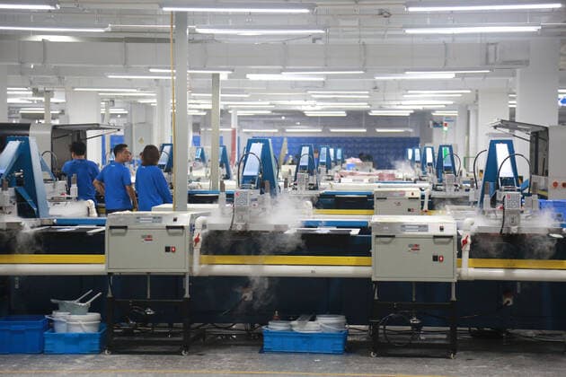 HANGZHOU, CHINA - SEPTEMBER 16: Employees work at the Xunxi Digital Factory on September 16, 2020 in Hangzhou, Zhejiang Province of China. Alibaba Group unveils its new manufacturing model - the Xunxi Digital Factory on Wednesday.  Copyright: xVCGx CFP111299078768