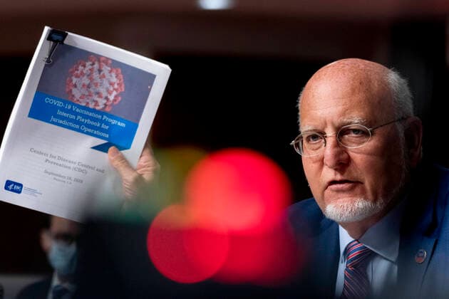 September 16, 2020, Washington, District of Columbia, USA: Dr. Robert Redfield, Director of the Centers for Disease Control and Prevention holds up a CDC document that reads COVID-19 Vaccination Program Interim Playbook for Jurisdiction Operations as he speaks appears at a Senate Appropriations subcommittee hearing on a Review of Coronavirus Response Efforts on Capitol Hill, Wednesday, Sept. 16, 2020, in Washington Washington USA - ZUMAs152 20200916_zaa_s152_120 Copyright: xAndrewxHarnikx-xxPoolxViaxCnpx