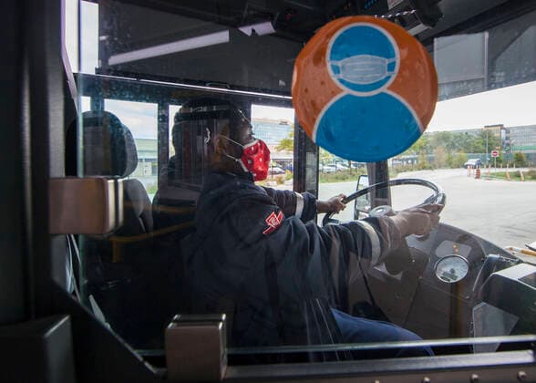 (200917) -- TORONTO, Sept. 17, 2020 -- A TTC bus driver wearing a face mask is seen on a bus in Toronto, Canada, on Sept. 17, 2020. Starting on Thursday, face coverings or masks are mandatory in all shared TTC (Toronto Transit Commission) spaces, both indoors and outdoors. This also applies to operators when they are behind the protective barrier or in the cab. (Photo by Xinhua) CANADA-TORONTO-COVID-19-MEASURES ZouxZheng 