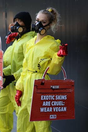 . 17 09 2020. London, United Kingdom. PETA supporters dressed in hazmat suits stage a protest against the use of exotic animal skins at London Fashion Week.  xStephenxLockx xi-Imagesx IIM-21623-0006