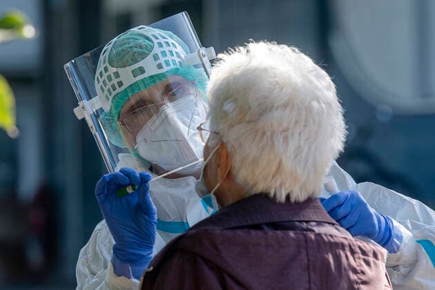 Daily number of new COVID-19 cases exceeds 2,000 in Czechia. A medic takes a sample for a covid-19 test at car testing point in Nachod, Czech Republic, September 18, 2020. (CTKxPhoto DavidxTanecek) CTKPhotoP202009180561901 TAD 001