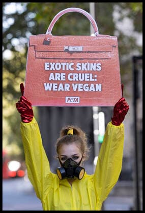 . 17 09 2020. London, United Kingdom. A PETA supporter dressed in a hazmat suit, part of a protest against the use of exotic animal skins at London Fashion Week.  xStephenxLockx xi-Imagesx IIM-21623-0028