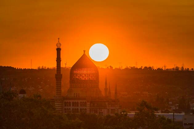 Yenidze Sunset behind the Yenidze, The former factory building of the Yenidze cigarette factory is one of the architectural sights of the city of Dresden It is located on Weißeritzstrasse on the eastern edge of Friedrichstadt, not far from the Congress Center The building, designed by Martin Hammitzsch fro
