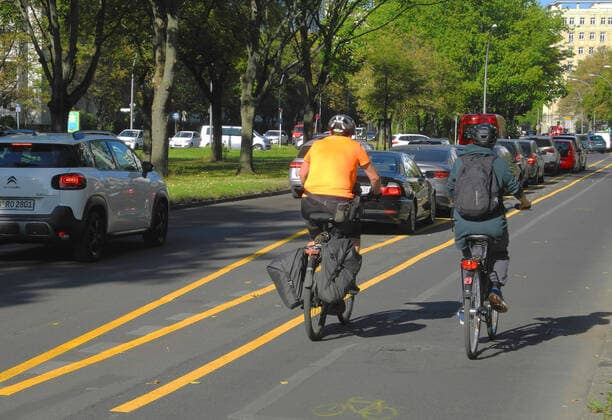 Only one lane for car, one lane for parking and then the widened bicycle path
