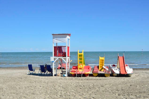 Colorful boats on the beach of Albarella, Italy Vacatio