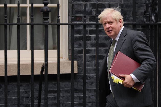 (200923) -- LONDON, Sept. 23, 2020 -- Britain s Prime Minister Boris Johnson leaves 10 Downing Street to attend Prime Minister s Questions at the House of Commons, in London, Britain, on Sept. 23, 2020. Johnson s controversial Brexit-related Internal Market Bill completed the first stage on Tuesday of its journey to becoming law. The bill, which ministers have admitted will breach the international law of Brexit agreement with the European Union (EU), passed its crucial second reading stage ahead in the House of Commons before heading to the House of Lords where it is expected to be given a stormy reception. (Photo by Xinhua) BRITAIN-LONDON-BREXIT-RELATED INTERNAL MARKET BILL TimxIreland 