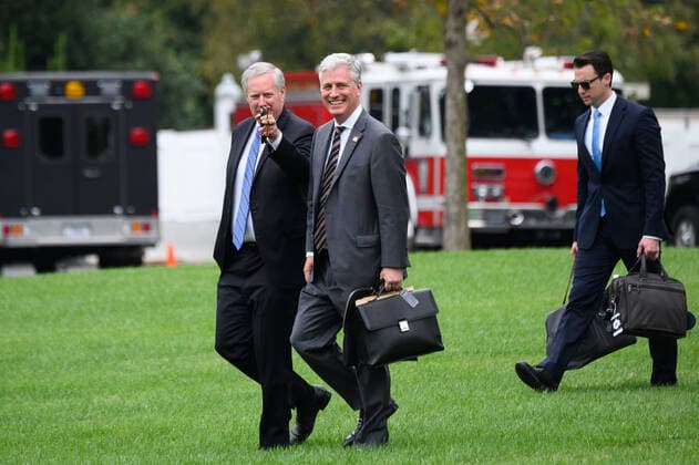 Mark Meadows, White House chief of staff, and Robert O Brien, national security adviser, walk on the South Lawn of the White House before boarding Marine One in Washington, DC on Thursday, September 24, 2020.  WAX202009249202 ERINxSCOTT