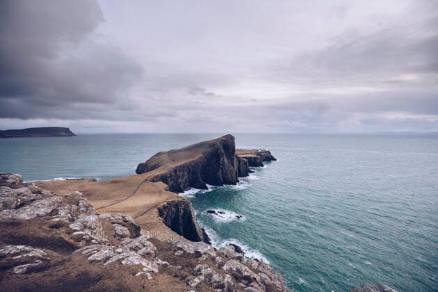 UK, Scotland, Cloudy sky over Neist Point peninsula RSGF00258
