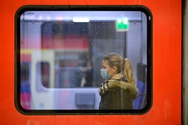 Coronavirus woman with face mask, sitting in train, corona crisis, Stuttgart, Baden Württemberg, Germany Stuttgart Baden Württemberg Germany Michael Weber IMAGEPOWER ,