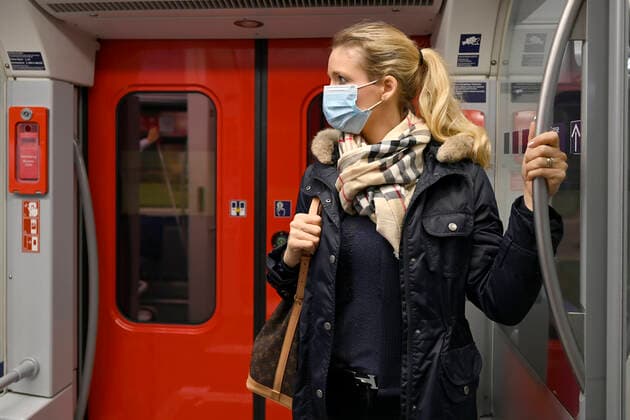 Coronavirus woman with face mask, standing in S-Bahn, corona crisis, Stuttgart, Baden Württemberg, Germany Stuttgart Baden Württemberg Germany Michael Weber IMAGEPOWER ,
