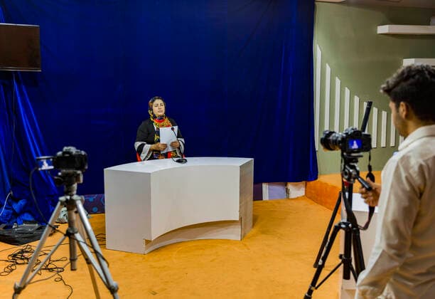(200927) -- HERAT, Sept. 27, 2020 -- An Afghan female presents a program for a local TV channel in Herat city, western Afghanistan, Sept. 26, 2020. (Photo by Xinhua) AFGHANISTAN-HERAT-FEMALE WORKER ElahaxSahel 