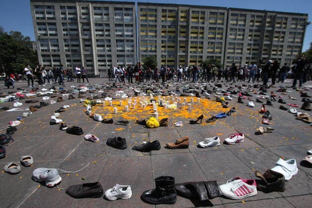 Mexico:52nd Anniversary of Massacre of Tlatelolco MEXICO CITY, MEXICO - OCTOBER 2: A person takes part during a ceremony to commemorate the 52th anniversary of the massacre of students in Tlatelolco. on October 2, 2020 in Mexico City, Mexico. On October 2, 1968 Students was killed while they were protesting against the Mexico s President Gustavo Diaz Ordaz at Plaza de las Tres Culturas **World Rights ** Mexico City Mexico Copyright: EyepixxGroup