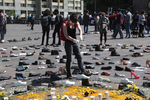 Mexico:52nd Anniversary of Massacre of Tlatelolco MEXICO CITY, MEXICO - OCTOBER 2: A person takes part during a ceremony to commemorate the 52th anniversary of the massacre of students in Tlatelolco. on October 2, 2020 in Mexico City, Mexico. On October 2, 1968 Students was killed while they were protesting against the Mexico s President Gustavo Diaz Ordaz at Plaza de las Tres Culturas **World Rights ** Mexico City Mexico Copyright: EyepixxGroup