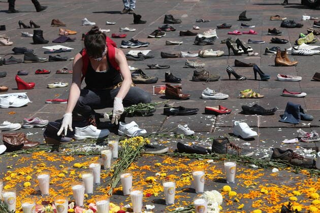 Mexico:52nd Anniversary of Massacre of Tlatelolco MEXICO CITY, MEXICO - OCTOBER 2: A person takes part during a ceremony to commemorate the 52th anniversary of the massacre of students in Tlatelolco. on October 2, 2020 in Mexico City, Mexico. On October 2, 1968 Students was killed while they were protesting against the Mexico s President Gustavo Diaz Ordaz at Plaza de las Tres Culturas **World Rights ** Mexico City Mexico Copyright: EyepixxGroup