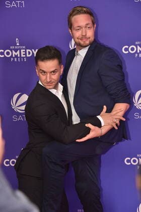 Comedian Özcan Cosar and Bastian Bielendorfer , l r, comes to the presentation of the German Comedy Award 2020