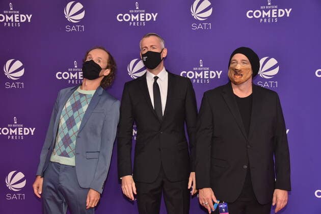 Olaf Schubert, Sebastian Puffpaff and Torsten Sträter , l r, comes with a mask to the presentation of the German Comedy Award 2020