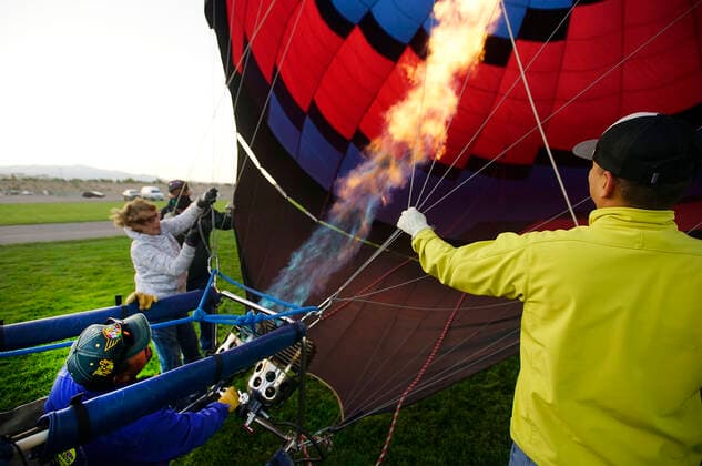 October 4, 2020, Albuquerque, NEW MEXICO, USA: 100420. Dream on pilot Tom Kious , left fires his burner before flying during the 2nd day of the Balloon Fall Fest .Photographed on Sunday October 4, 2020. Adolphe Pierre-LouisJournal Albuquerque USA - ZUMAab1_ 20201004_zaf_ab1_005 Copyright: xAlbuquerquexJournalx