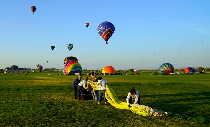 October 4, 2020, Albuquerque, NEW MEXICO, USA: 100420.A crew folds a balloon envelope during the 2nd day of the Balloon Fall Fest .Photographed on Sunday October 4, 2020. Adolphe Pierre-LouisJournal Albuquerque USA - ZUMAab1_ 20201004_zaf_ab1_002 Copyright: xAlbuquerquexJournalx