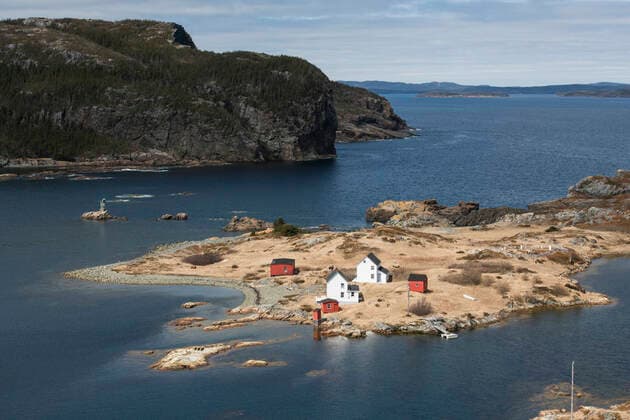 Houses on island with ocean in background St. John s, NL, Canada CR_BRHU200930-501902-01