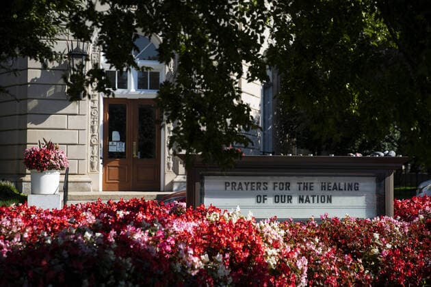 A sign related to the coronavirus pandemic is seen on Capitol Hill in Washington, D.C., U.S., on Tuesday, Oct. 6, 2020.  WAP20201006266 SARAHxSILBIGER