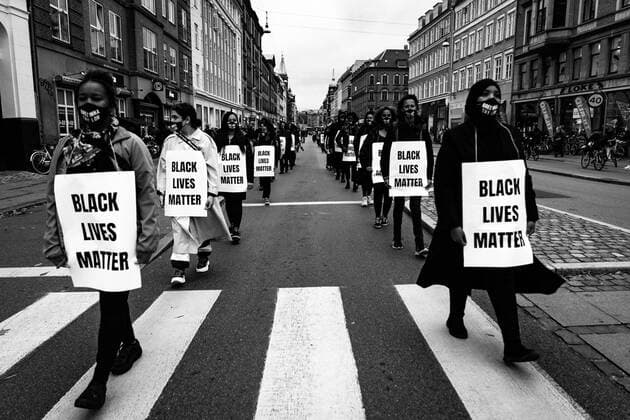 Protesters from the movement Black Lives matter BLM lie on the ground on Queen Louises Bridge, to symbolize that Breonna Taylor was asleep when she was awakened and killed by eight shots in March this year in the USA, at Noerrebro in Copenhagen on Tuesday, October 6, 2020 The demonstration is in solidari  Copyright: RitzauxScanpix EmilxHelmsx cop602 spdk20201006-202632-L