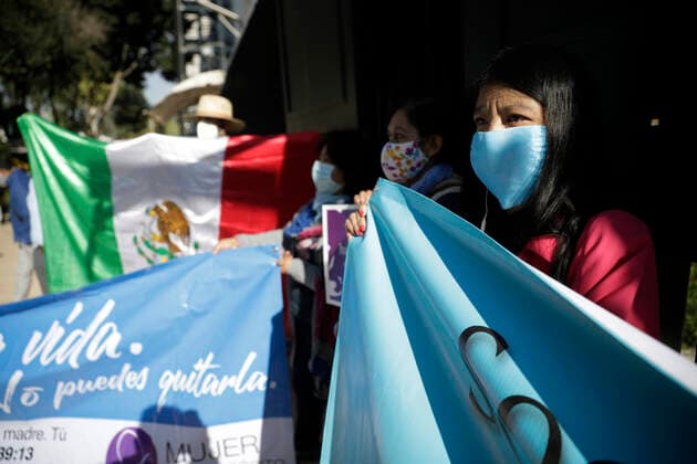 Mexico: Protest against legalization of Abortion Demonstrators of National Front For Family take part during a protest against legalization of abortion in the country, outside the Senate of Mexico, while Senators discuss the modification of a law for the decriminalization or not of abortion in Mexico City, Mexico. **World Rights ** Mexico City Mexico Copyright: MarianaxBae