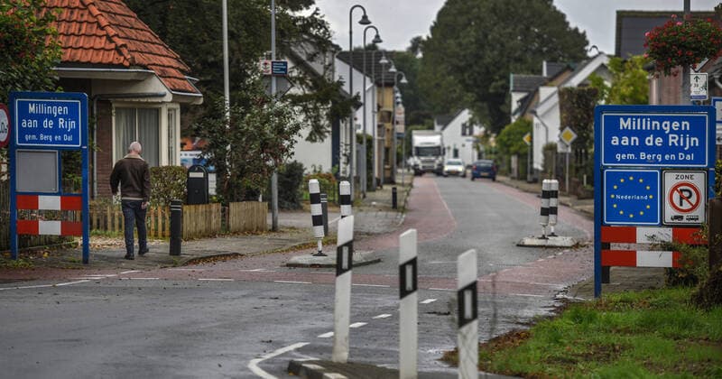 A pedestrian crosses the Dutch-German border between Bimmen D and Millingen NL in the Kleve district As the State Chancellery in Düsseldorf has announced, the rules for local border traffic have now been relaxed A Cross Border Task Force Corona is responsible for crisis management The Dutch-German border