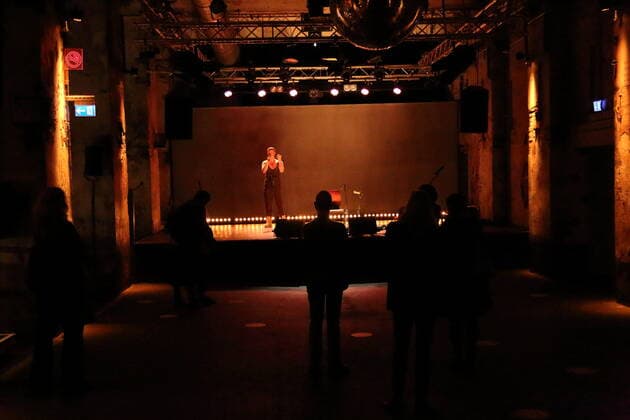 Colin Self and concert visitors at SchwuZ during the photo rehearsal for the concert installation The World To Come at Vollgutlager and SchwuZ in Berlin, 7 October 2020 A production of the Rundfunkchor Berlin After Ludwig van Beethovens Missa solemnis concept and scene Tilman Hecker Premiere is on 8 October 2020 Rundfunkchor Berlin The World To Come