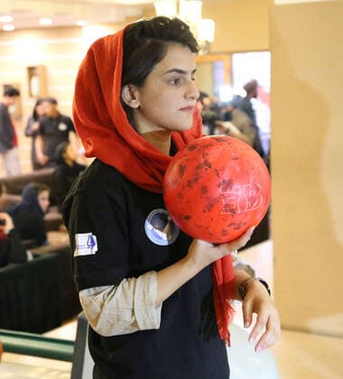 (201008) -- KABUL, Oct. 8, 2020 -- An Afghan girl plays bowling during a competition at a club in Kabul, Afghanistan, Oct. 8, 2020. (Photo by Xinhua) (SP)AFGHANISTAN-KABUL-BOWLING CLUB-WOMEN SayedxMominzadah 