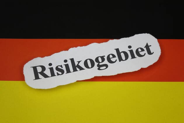 German flag and risk area German flag and risk area, 08 10 2020, Borkwalde, Brandenburg, On a German flag there is the lettering risk area