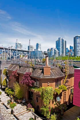 Canada, British Columbia, Vancouver, View from Granville Island, Floating house in the foreground UM000661