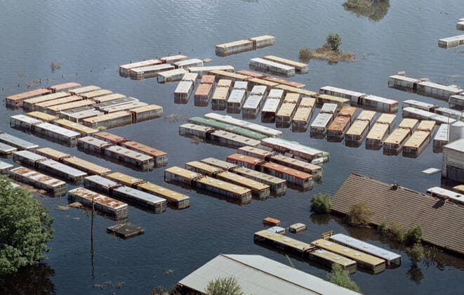 Oder flood 1997 Aurith, DEU, 02 08 97 Busses in a bus depot, in the flooded village Aurith in the Ziltendorfer Niederung Aurith Germany