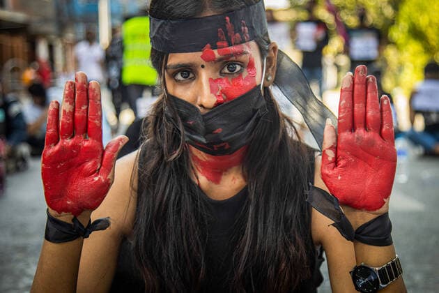 Bilder des Jahres 2020, News 10 Oktober News Themen der Woche KW42 News Bilder des Tages October 17, 2020, Kathmandu, Bagmati, Nepal: A female youth activist wearing a mask is seen with red paint on her face and hands to symbolize blood shed of the victims of rape during the protest against rape in Kathmandu..The incidence of rape has been increasing over the years with the previous fiscal year 2019 20 recording 2,144 cases of rape and 687 cases of rape attempt where most victims were minor girls. Kathmandu Nepal - ZUMAs197 20201017_zaa_s197_007 Copyright: xSujanxShresthax