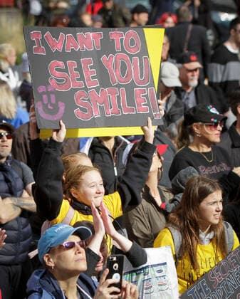 (201017) -- VANCOUVER, Oct. 17, 2020 -- A protester holds a sign as she takes part in an anti-restriction rally in Vancouver, British Columbia, Canada, on Oct. 17, 2020. Thousands of protesters took part in the anti-coronavirus-restriction rally to express their disapproval over a number of topics including lockdowns, mask mandates, quarantine, travel bans and social distancing. (Photo by Xinhua) CANADA-VANCOUVER-COVID-19-ANTI-RESTRICTION PROTEST LiangxSen 
