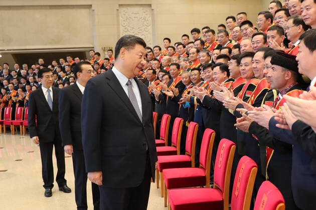 (201020) -- BEIJING, Oct. 20, 2020 -- Chinese President Xi Jinping, also general secretary of the Communist Party of China (CPC) Central Committee and chairman of the Central Military Commission, meets with representatives from model organizations and individuals who receive awards for promoting military-civilian solidarity, in Beijing, capital of China, Oct. 20, 2020. Also present were Premier Li Keqiang and Wang Huning, a member of the Secretariat of the CPC Central Committee, both of whom are members of the Standing Committee of the Political Bureau of the CPC Central Committee. ) CHINA-BEIJING-XI JINPING-ROLE MODELS-MEETING (CN) HuangxJingwen