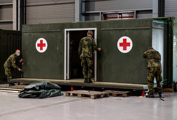 The military present a field hospital, that will act as a back-up facility for patients with the coronavirus, in the grounds of the PVA EXPO Praha Letnany in the Letnany neighbourhood at Prague outskirts, Czech Republic, on Thursday, October 22, 2020. (CTKxPhoto RomanxVondrous) CTKPhotoP202010220535901 vnd 15 K