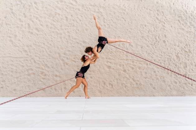 Creative Highlights Symbolfotos Aerial dancers dancing while hanging against wall model released Symbolfoto DLTSF01262