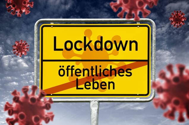 PHOTOMONTAGE, place-name sign with Lockdown lettering and crossed-out lettering public life, corona crisis and Lockdown ** NUR FUER REDAKTIONELLE ZWECKE ** EDITORIAL USE ONLY **
