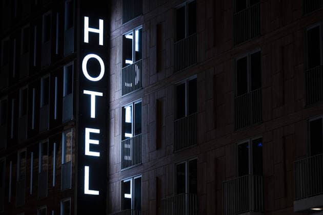 An illuminated sign with the words Hotel stands out in the dark in Berlin, 27 10 2020 Hotels have lost a lot of revenue due to travel restrictions caused by the Corona virus Berlin Germany Copyright: xFlorianxGaertner photothek.netx