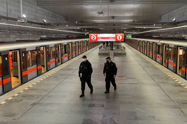 Curfew in Czechia from 21:00 to 04:59. During the night, people may go to and from work, make urgent trips to a doctor and walk the dog outside, but only within up to a half-kilometre distance from their homes. Policemen in metro (underground, Prague subway) station Muzeum in the centre of Prague, Czech Republic, October 28, 2020. (CTKxPhoto VitxSimanek) CTKPhotoP202010281107201  VIS 006