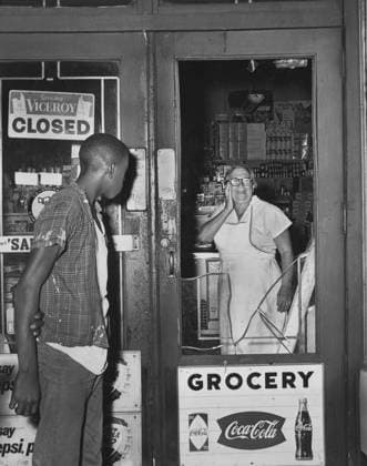 Mrs. Anna Kelter, 67, looks in horror at damage done by rioters to her store after night of rioting due to fatal shooting of Teen James Powell by Police Officer Lt. Thomas Gilligan, 551 Nostrand Avenue, Brooklyn, New York, USA, Stanley Wolfson, World Telegram & Sun, July 21, 1964  Copyright: xCircaxImagesx ghi-circa08792