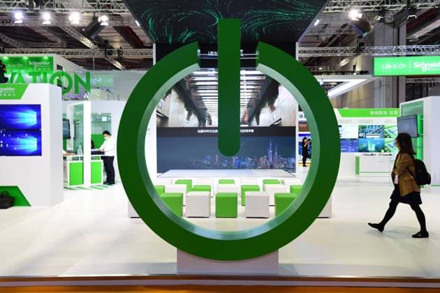 SHANGHAI, CHINA - NOVEMBER 05: People visit the Schneider Electric stand during the 3rd China International Import Expo (CIIE) at the National Exhibition and Convention Center on November 5, 2020 in Shanghai, China.  Copyright: xVCGx CFP111305487397