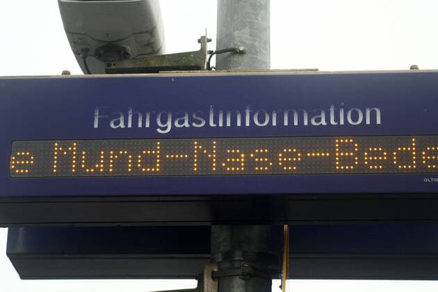 DB Deutsch Bahn Train railway Coronavirus. Station advise to wear Mask in the Schwarzenbruck Station , in Schwarzenbruck , Bayern , Deutschland . November 10, 2020.
