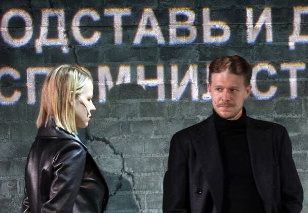 MOSCOW, RUSSIA - NOVEMBER 10, 2020: Actress Alexandra Rebenok and actor Nikita Yefremov in a scene from a theater production of Fyodor Dostoyevsky s novel Demons staged by director Konstantin Bogomolov at the Palace on the Yauza theater and concert hall. Sergei Fadeichev TASS  TS0EDC7A
