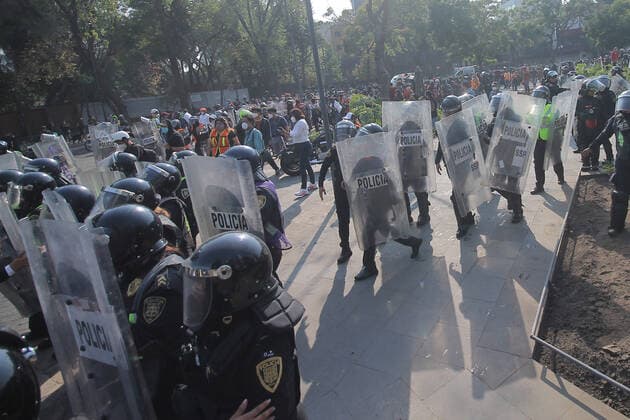 MEXICO CITY,, MEXICO - NOVEMBER 11: Riot police confront protesters during a demonstration who demand justice for the Femicide of Bianca Alejandrina Alexis in Cancun on November 11, 2020 in Mexico City, Mexico. Credit: Ricardo Castelan Cruz Eyepix Group The Photo Access MEX - 2020 - Protest Against The Femicide In Mexico City  Copyright: xRicardoxCastelanxCruzx