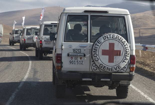 NAGORNO-KARABAKH - NOVEMBER 12, 2020: A column of Red Cross vehicles heads for Stepanakert, capital of the Nagorno-Karabakh Republic. On 9 November, Armenia s Prime Minister Nikol Pashinyan, Russia s President Vladimir Putin and Azerbaijan s President Ilham Aliyev signed an agreement on a complete ceasefire in the disputed Caucasus region of Nagorno-Karabakh. Stanislav Krasilnikov TASS  TS0EE134