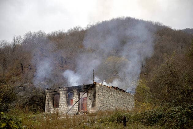 Bilder des Jahres 2020, News 11 November News Themen der Woche KW46 News Bilder des Tages NAGORNO-KARABAKH - NOVEMBER 14, 2020: A burning house left by residents in the village of Chorekdar. On 10 November, Armeniaâ€™s Prime Minister Nikol Pashinyan, Russiaâ€™s President Vladimir Putin, and Azerbaijanâ€™s President Ilham Aliyev signed a joint statement on a complete ceasefire in Nagorno-Karabakh. The Russian leader said the Azerbaijani and Armenian sides would maintain the positions that they had held and Russian peacekeepers would be deployed to the region. According to the document, Armenia has to hand over the Nagorno-Karabakh districts of Kalbajar, Lachin, and Agdam, to Azerbaijan till November 15, December 1, and November 20, respectively. Stanislav Krasilnikov TASS  TS0EE409