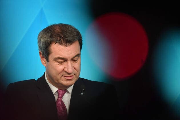 Markus SOEDER State Premier of Bavaria and CSU Chairman behind red light, single image,cut single motif,portrait,portrait,portrait Press conference of the Bavarian State Government on the Corona Pandemic and the Lockdown Light,Breakwater on 18 11 2020 at the Prince Carl Palais in Munich