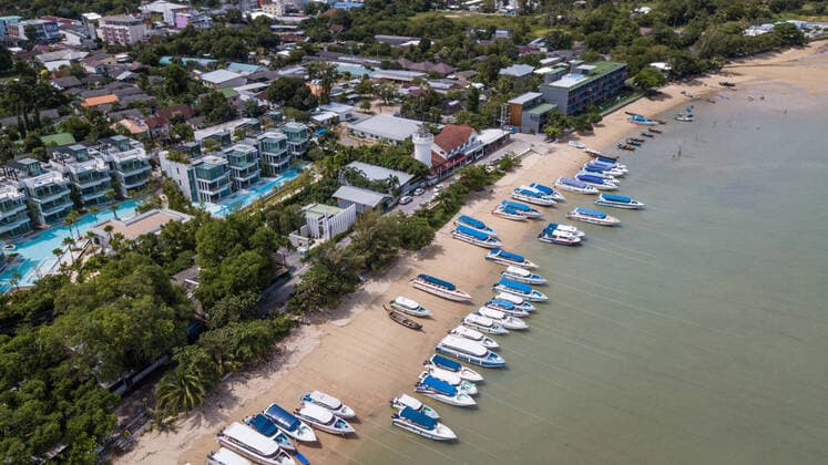 (201120) -- PHUKET, Nov. 20, 2020 -- Aerial photo taken on Sept. 14, 2020 shows the yachts at Phuket, Thailand. Phuket, the largest island of Thailand, lies off the west coast of Thailand in the Andaman Sea. It is among the world s finest beach destinations, with fine white sands, nodding palm trees, glittering seas and lively towns. ) (CitySketch)THAILAND-PHUKET ZhangxKeren 