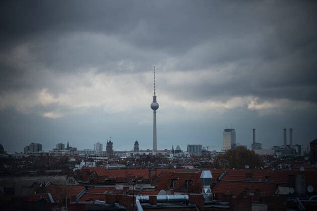 View over residential houses in Neukoelln in direction of the city center and the television tower in Berlin Photo picture enclosure living in Berlin